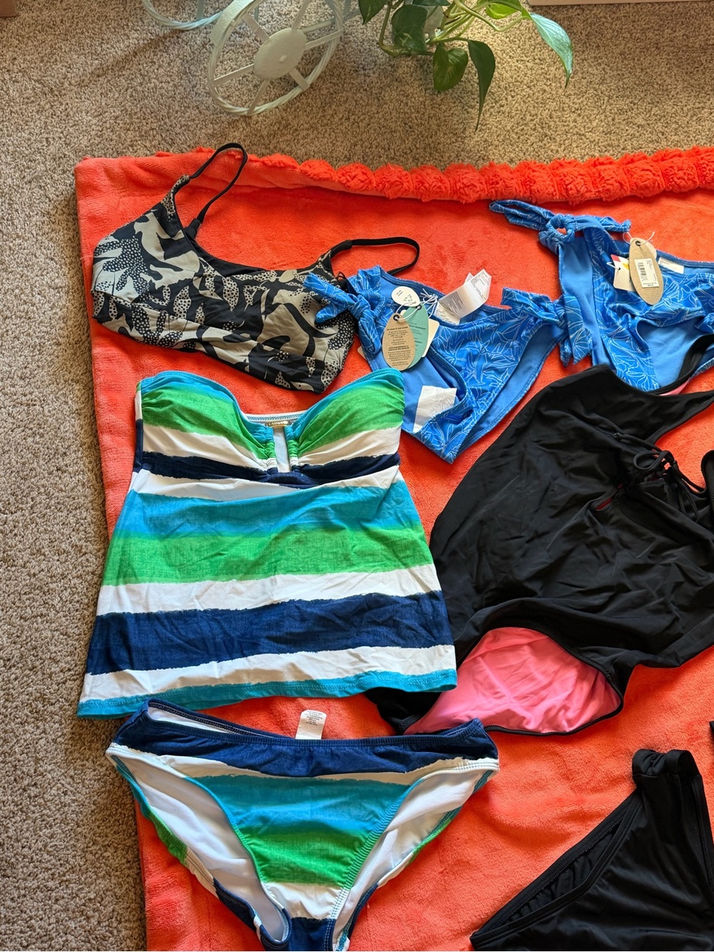A HUGE bundle of bikinis, tankini’s, and whole pieces of swimsuits. 16 pieces